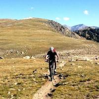 This guy is riding along a track